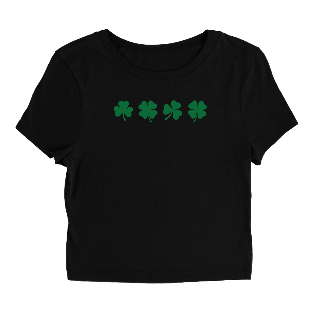 Product image of black baby tee with four green shamrocks. Good for St Patricks day outfits
