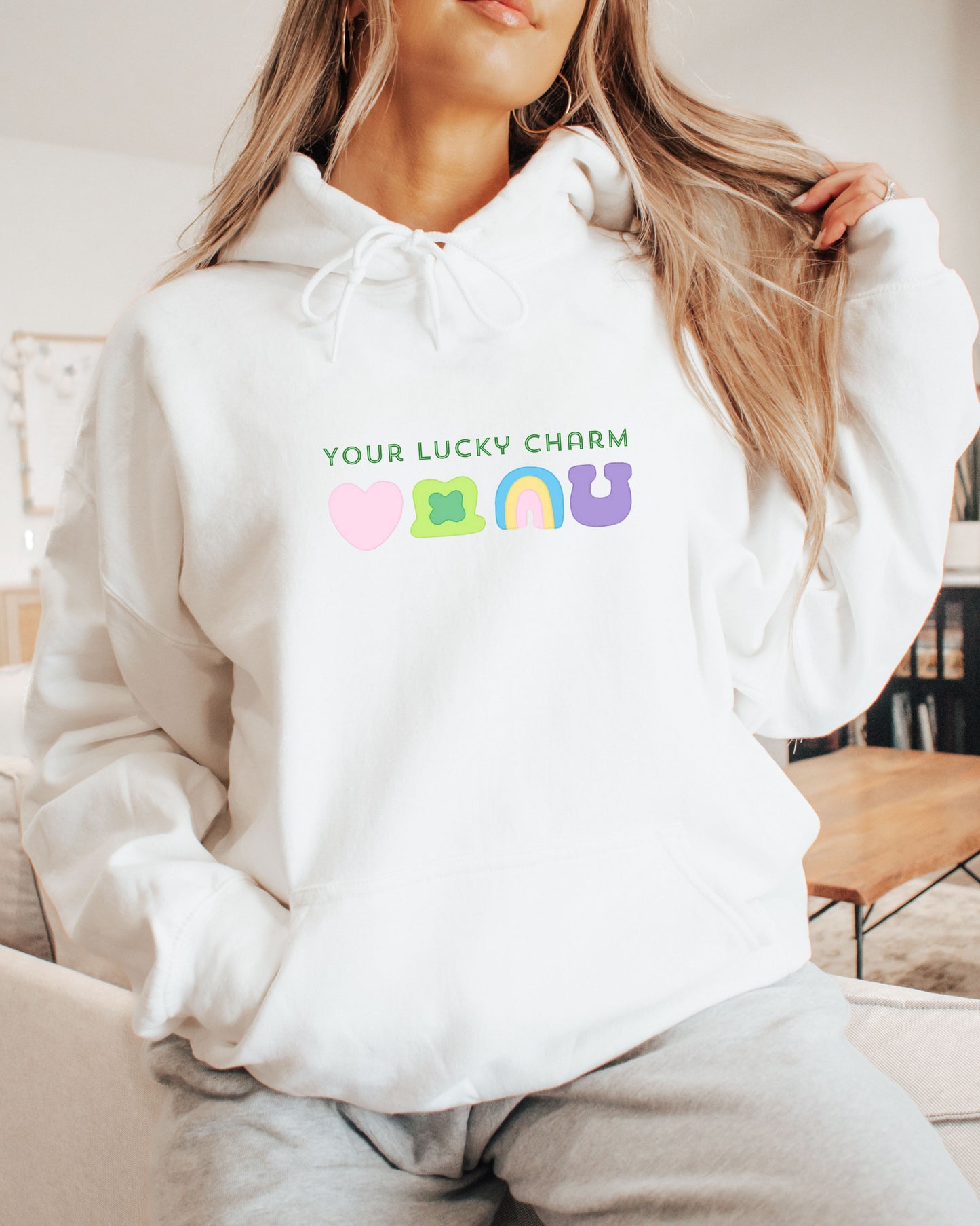 White hoodie with shamrock and St. Patricks Day themed items