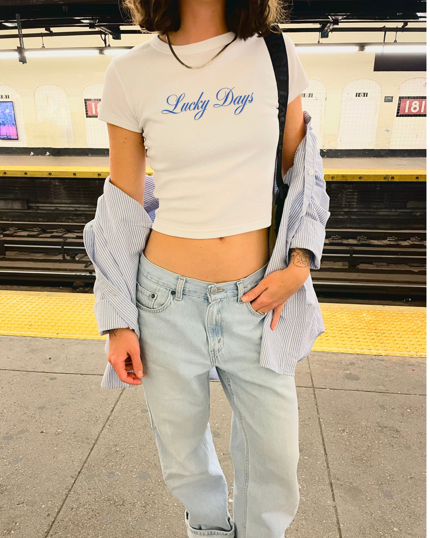 Model wearing the vintage Lucky Days crop top